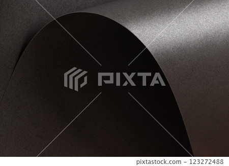Charcoal gray paper background with a pearlescent, glossy texture. Deep graphite and gunmetal tones Charcoal gray paper background with a pearlescent, glossy texture. Deep graphite and gunmetal tones 123272488
