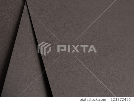Dark espresso brown paper background with a smooth matte texture and subtle geometric lines. Rich Dark espresso brown paper background with a smooth matte texture and subtle geometric lines. Rich 123272495