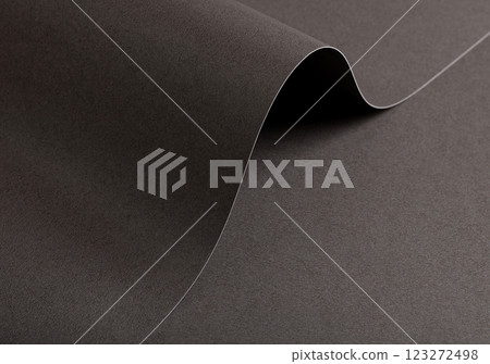 Dark espresso brown paper background with a smooth matte texture and wavy edges. Rich cocoa and Dark espresso brown paper background with a smooth matte texture and wavy edges. Rich cocoa and 123272498