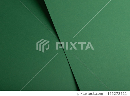Deep emerald green paper background with a smooth texture and subtle folds. Rich forest and pine Deep emerald green paper background with a smooth texture and subtle folds. Rich forest and pine 123272511