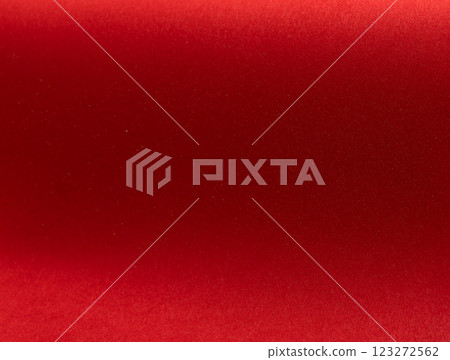Fiery crimson paper background with a velvety smooth texture and rich ruby tones. Soft satin Fiery crimson paper background with a velvety smooth texture and rich ruby tones. Soft satin 123272562