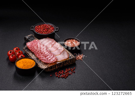 Delicious fresh smoked sausages cut with slices 123272665