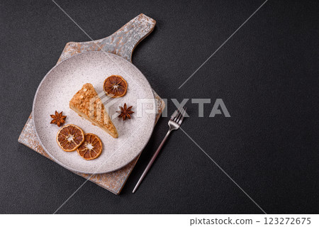 Piece of sweet layer cake Napoleon with custard 123272675