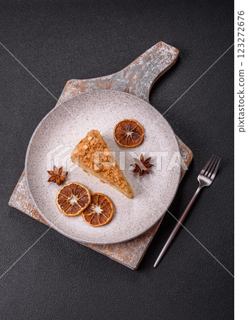 Piece of sweet layer cake Napoleon with custard 123272676