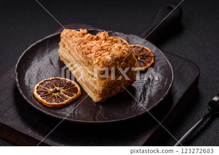 Piece of sweet layer cake Napoleon with custard Piece of sweet layer cake Napoleon with custard 123272683