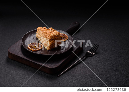 Piece of sweet layer cake Napoleon with custard Piece of sweet layer cake Napoleon with custard 123272686