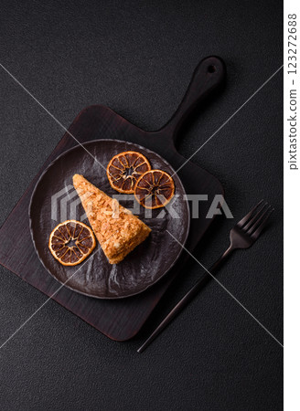 Piece of sweet layer cake Napoleon with custard 123272688