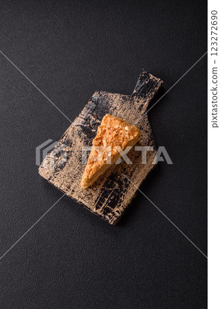 Piece of sweet layer cake Napoleon with custard 123272690