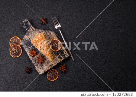 Piece of sweet layer cake Napoleon with custard 123272698