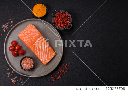 Fresh raw salmon steak with spices and herbs 123272708