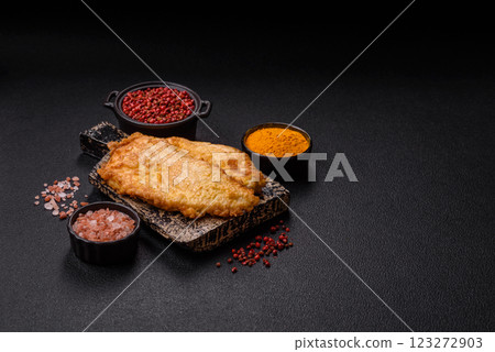 Grilled chicken or turkey chop with salt, spices and herbs Grilled chicken or turkey chop with salt, spices and herbs 123272903