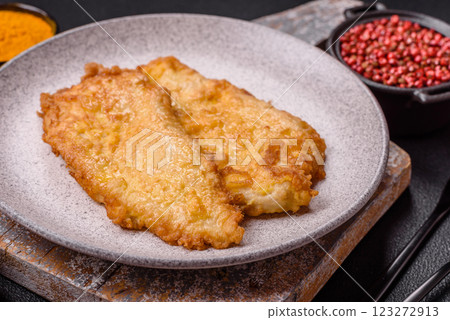 Grilled chicken or turkey chop with salt, spices and herbs 123272913