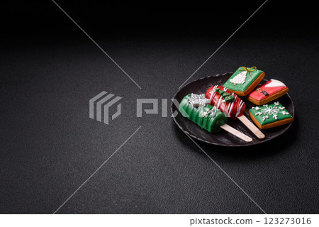 Natural popsicle ice cream on a stick in the style and colors of Christmas 123273016