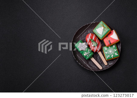 Natural popsicle ice cream on a stick in the style and colors of Christmas 123273017