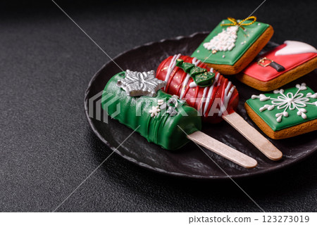 Natural popsicle ice cream on a stick in the style and colors of Christmas Natural popsicle ice cream on a stick in the style and colors of Christmas 123273019