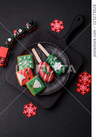 Natural popsicle ice cream on a stick in the style and colors of Christmas Natural popsicle ice cream on a stick in the style and colors of Christmas 123273028