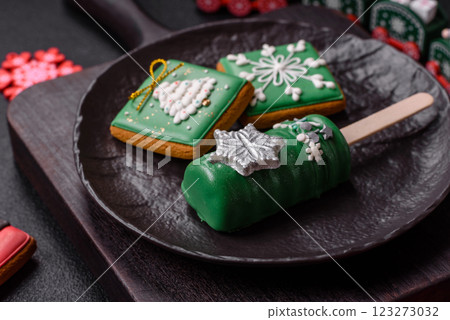 Natural popsicle ice cream on a stick in the style and colors of Christmas Natural popsicle ice cream on a stick in the style and colors of Christmas 123273032