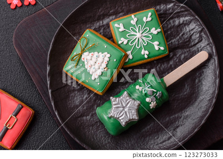 Natural popsicle ice cream on a stick in the style and colors of Christmas Natural popsicle ice cream on a stick in the style and colors of Christmas 123273033