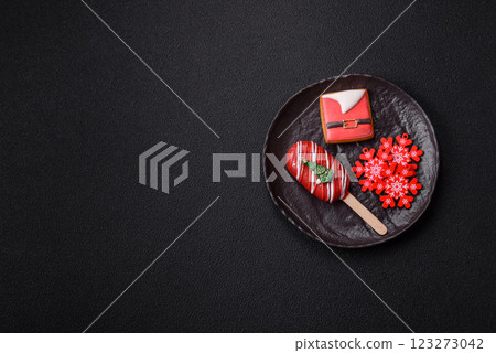 Natural popsicle ice cream on a stick in the style and colors of Christmas 123273042