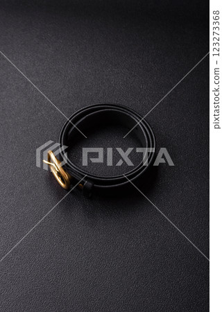 New leather women's belt with an old-style metal buckle New leather women's belt with an old-style metal buckle 123273368