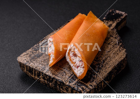 Crepes rolled with cream cheese sweet or sour 123273614