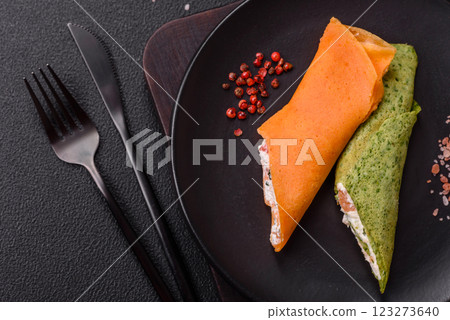 Crepes rolled with cream cheese sweet or sour 123273640