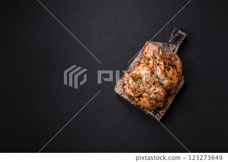 Grilled boneless chicken thigh with salt, spices and herbs 123273649