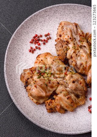 Grilled boneless chicken thigh with salt, spices and herbs 123273665