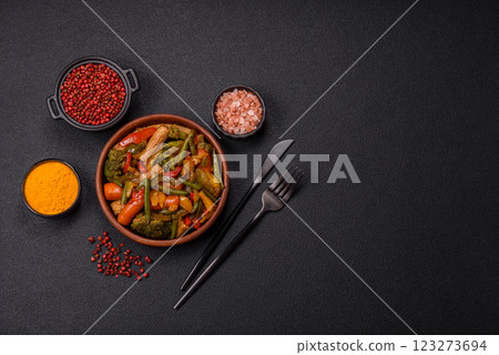 Mix of vegetables corn, carrots, peppers, broccoli, onions in teriyaki sauce 123273694