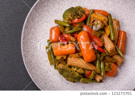 Mix of vegetables corn, carrots, peppers, broccoli, onions in teriyaki sauce Mix of vegetables corn, carrots, peppers, broccoli, onions in teriyaki sauce 123273701