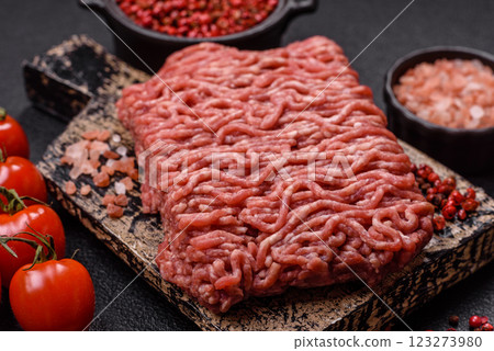 Fresh raw ground minced beef with salt and spices 123273980