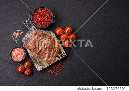 Crispy fried pork bacon sliced with salt, spices and herbs 123274301