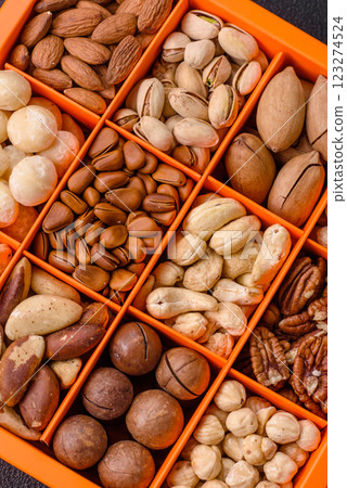 Box with various nuts cashew, macadamia, peanut, cedar, pecan, walnut, brazil, hazelnut Box with various nuts cashew, macadamia, peanut, cedar, pecan, walnut, brazil, hazelnut 123274524