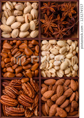 Box with various nuts cashew, macadamia, peanut, cedar, pecan, walnut, brazil, hazelnut Box with various nuts cashew, macadamia, peanut, cedar, pecan, walnut, brazil, hazelnut 123274557