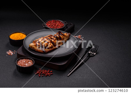 Grilled mackerel fillets with cheese, salt, spices and herbs 123274610