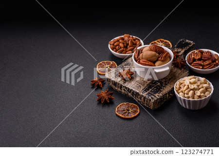 Delicious nutritious pecan nuts in ceramic bowl Delicious nutritious pecan nuts in ceramic bowl 123274771