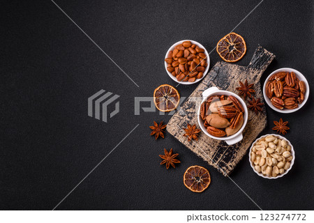 Delicious nutritious pecan nuts in ceramic bowl 123274772