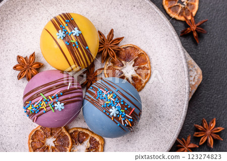 Sweet cocoa bombs with marshmallows and chocolate Sweet cocoa bombs with marshmallows and chocolate 123274823