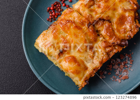 Lasagna or pasta layered with meat, cheese, salt, spices and herbs Lasagna or pasta layered with meat, cheese, salt, spices and herbs 123274896