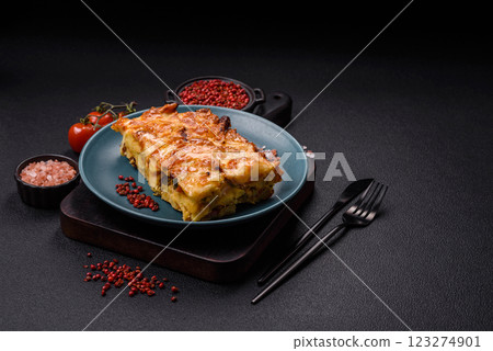 Lasagna or pasta layered with meat, cheese, salt, spices and herbs Lasagna or pasta layered with meat, cheese, salt, spices and herbs 123274901