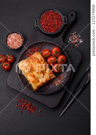 Lasagna or pasta layered with meat, cheese, salt, spices and herbs Lasagna or pasta layered with meat, cheese, salt, spices and herbs 123274906
