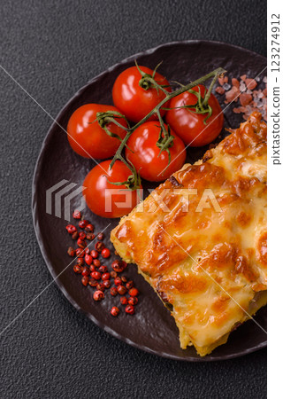 Lasagna or pasta layered with meat, cheese, salt, spices and herbs Lasagna or pasta layered with meat, cheese, salt, spices and herbs 123274912
