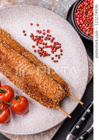 Lula kebab meat fried on a fire in breading with salt, spices and herbs Lula kebab meat fried on a fire in breading with salt, spices and herbs 123274936
