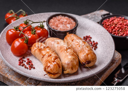 Grilled sausages with spices and herbs Grilled sausages with spices and herbs 123275058