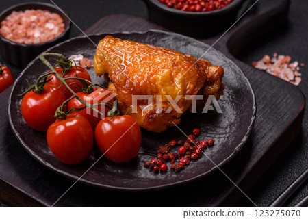 Delicious juicy chicken thighs baked with salt, spices and herbs 123275070