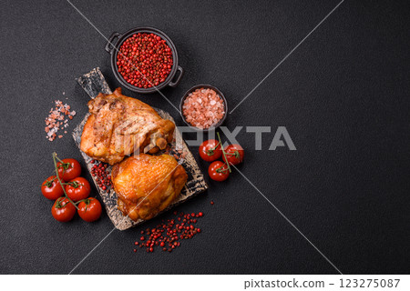Delicious juicy chicken thighs baked with salt, spices and herbs 123275087