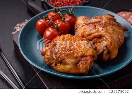 Delicious juicy chicken thighs baked with salt, spices and herbs 123275092