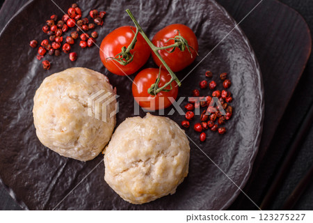 Delicious healthy steamed chicken cutlets or minced meatballs 123275227