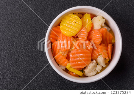 Delicious fresh vegetables steamed carrots, broccoli, cauliflower 123275284