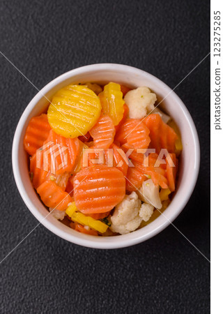 Delicious fresh vegetables steamed carrots, broccoli, cauliflower 123275285